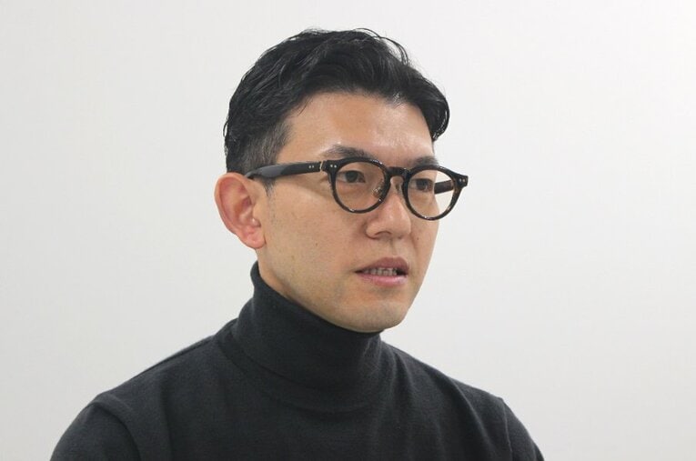 青山学院大学が33年ぶりに箱根駅伝に出場した2009年、6区を走った岡崎隼也さん。コンディションが整わず、区間最下位の苦しいレースとなった ／ photograph by Number Web