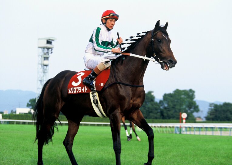 メジロブライトと鞍上の河内洋　©Keiji Ishikawa