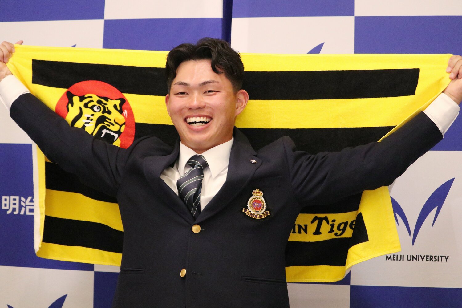 阪神からドラフト１位指名を受けた明大の榊原七斗外野手　©JIJI PRESS