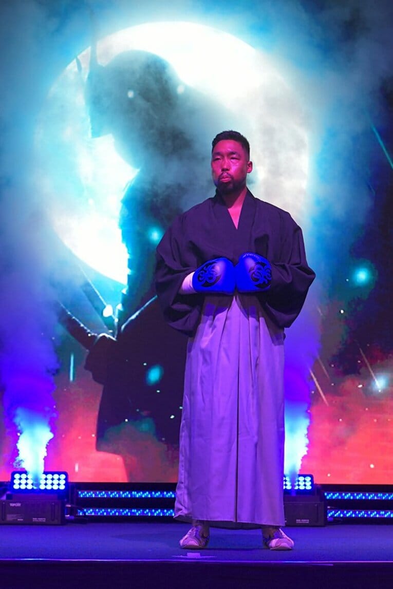 日本時代はアース・ウィンド・アンド・ファイアーの曲で入場し、アフロヘアーでリングに上がっていた　©Kokou Sekine