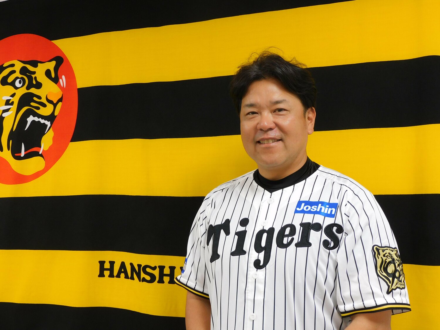 NumberWebのインタビューに応じた野村克則氏（52歳）。現在、阪神タイガースで一軍バッテリーコーチをつとめる