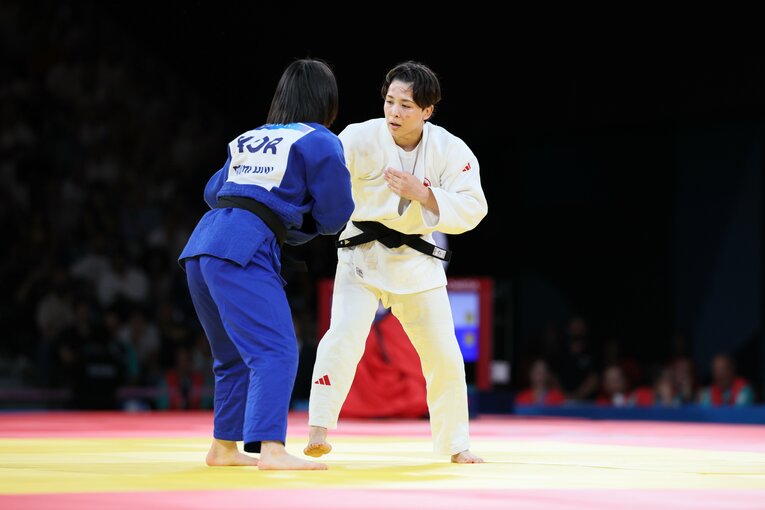 出口とホ・ミミの激闘　©Kaoru Watanabe/JMPA