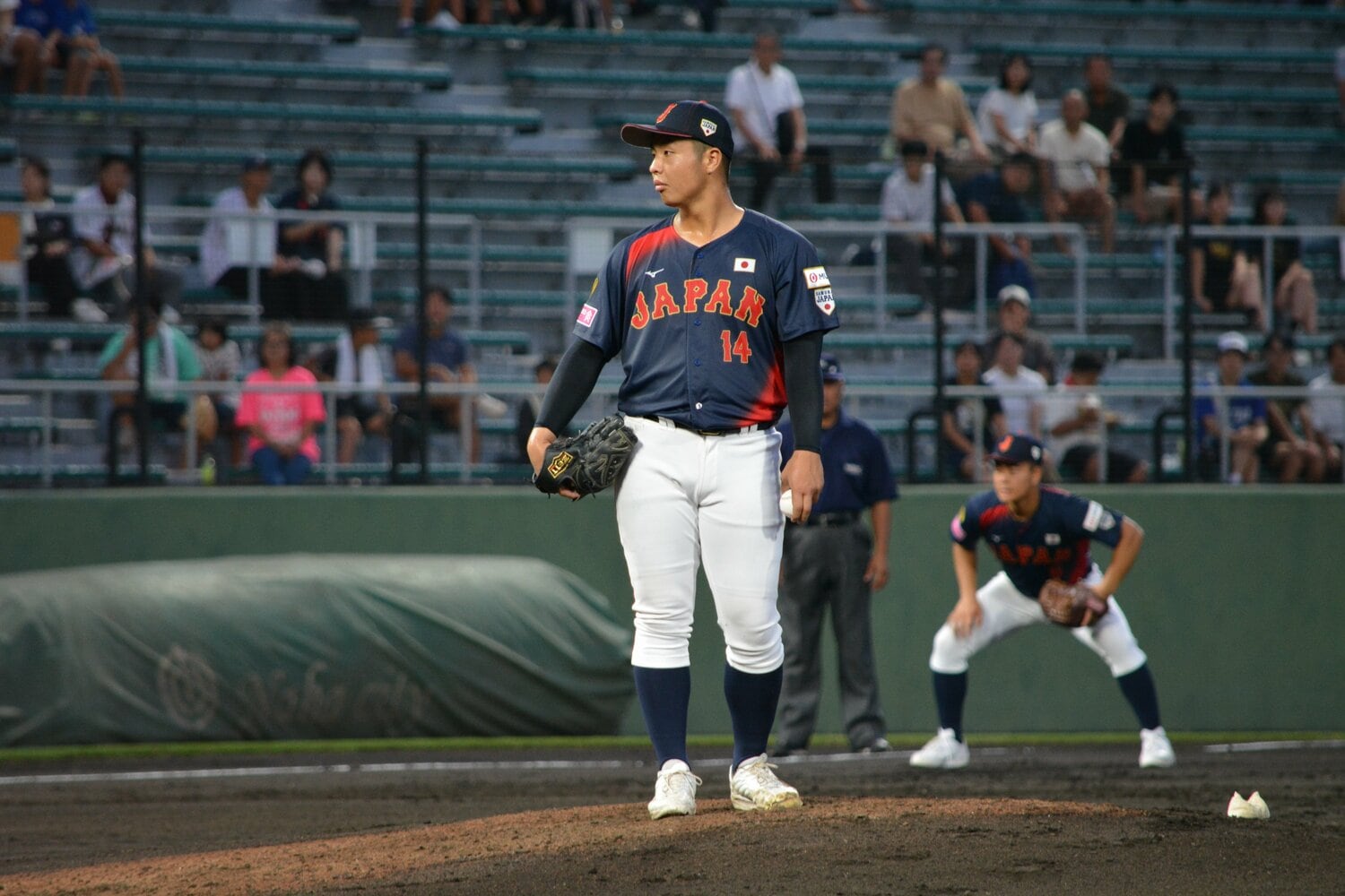 スーパーラウンド・アメリカ戦の末吉良丞。強力打線にヒットすら許さなかった　©Takarin Matsunaga