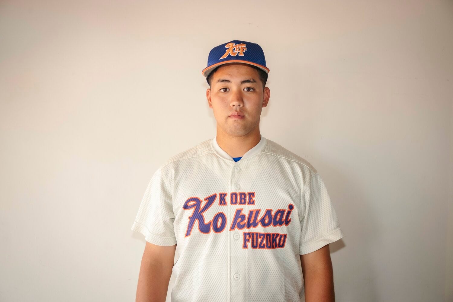 津嘉山憲志郎投手　神戸国際大付提供