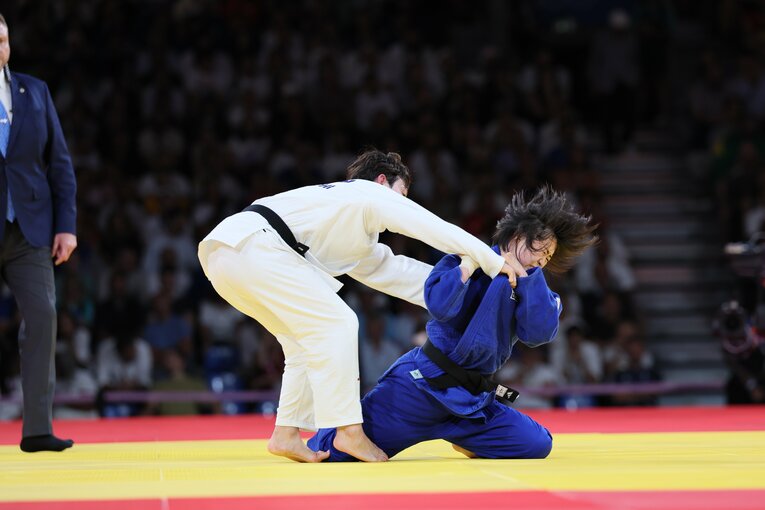 出口とホ・ミミの激闘　©Kaoru Watanabe/JMPA