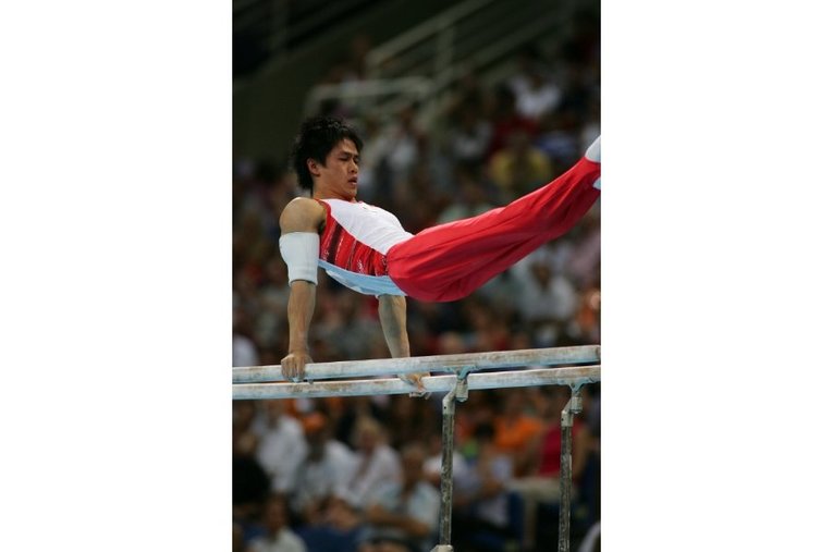 アテネ五輪の冨田洋之 ／ photograph by Takuya Sugiyama/JMPA