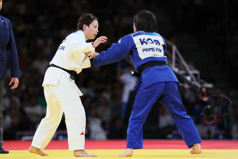 出口とホ・ミミの激闘　©Kaoru Watanabe/JMPA