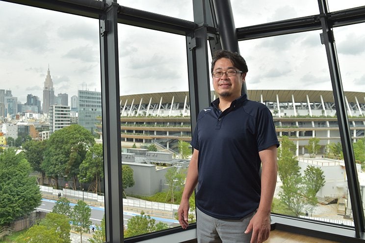 投資銀行から事務局長に転身した坂本氏。延びた1年間をいかに有効に使うかが重要だという。