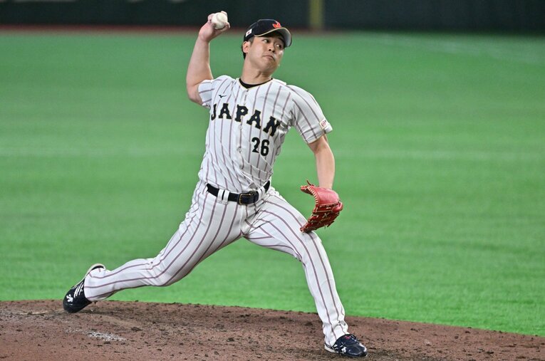 WBC日韓戦で3番手として7回に登板した種市篤暉は、三者連続三振に切ってとり試合の流れを一気に引き寄せた ／ photograph by Hideki Sugiyama