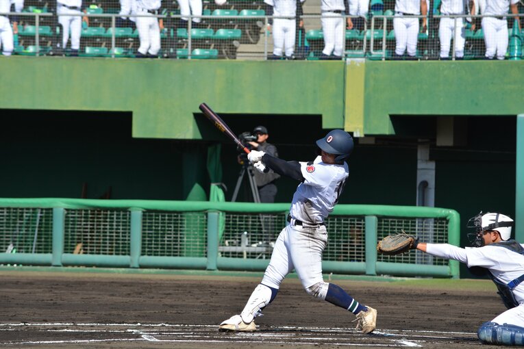 末吉のバッティング　©Takarin Matsunaga