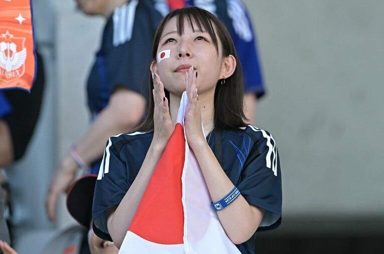 現地で声援を送る日本人サポーターたち　©Takuya Kaneko/JMPA