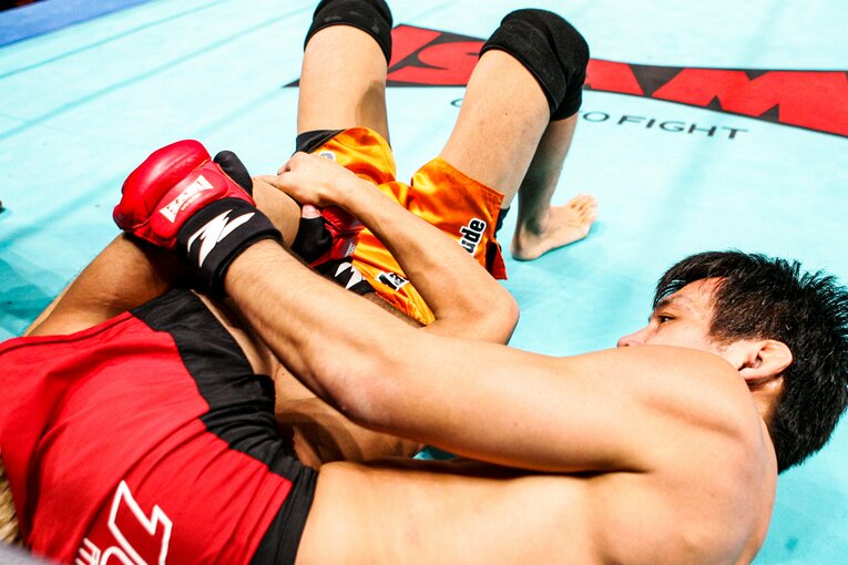 三角絞めで一本勝ち　©Susumu Nagao