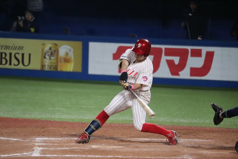 体重は入学時より10キロ以上増え、打撃もパワーアップ。3年秋にはリーグ打点王、4年秋にはベストナインに選出された　©Genki Taguchi