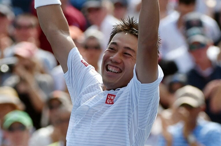 2014年全米オープン準決勝でジョコビッチを下し、喜びを爆発させる錦織圭　©AFP/JIJI PRESS　【スワイプするとそのほかの写真もご覧になれます】