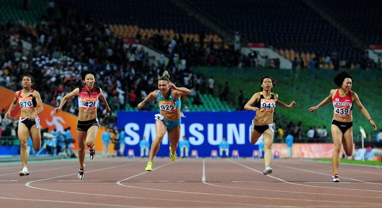 2010年アジア大会100mで金メダルを獲得 ©︎Getty Images