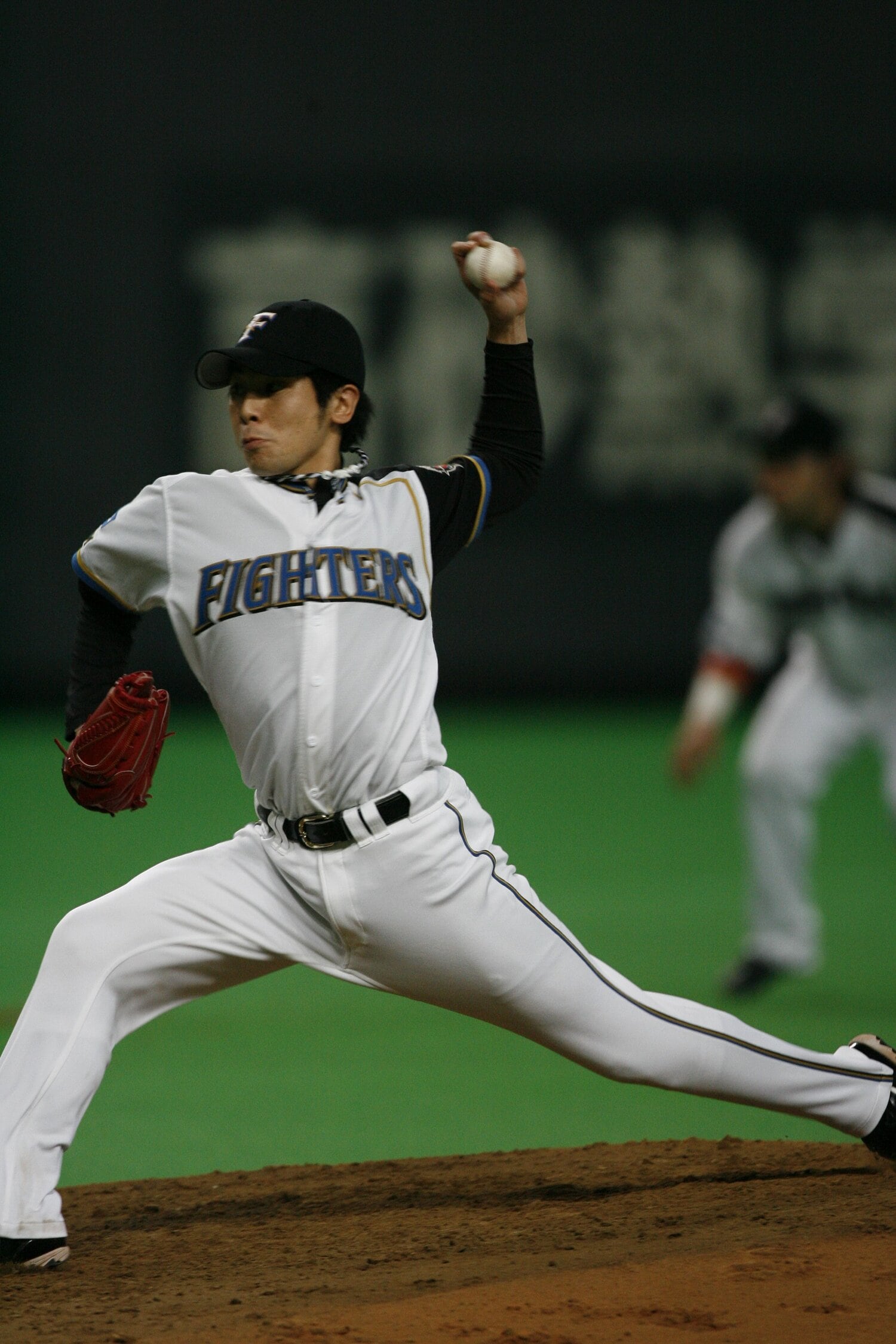 野間口から1年遅れのドラフトで日ハムに入団した武田。左のエースとして活躍した　©BUNGEISHUNJU