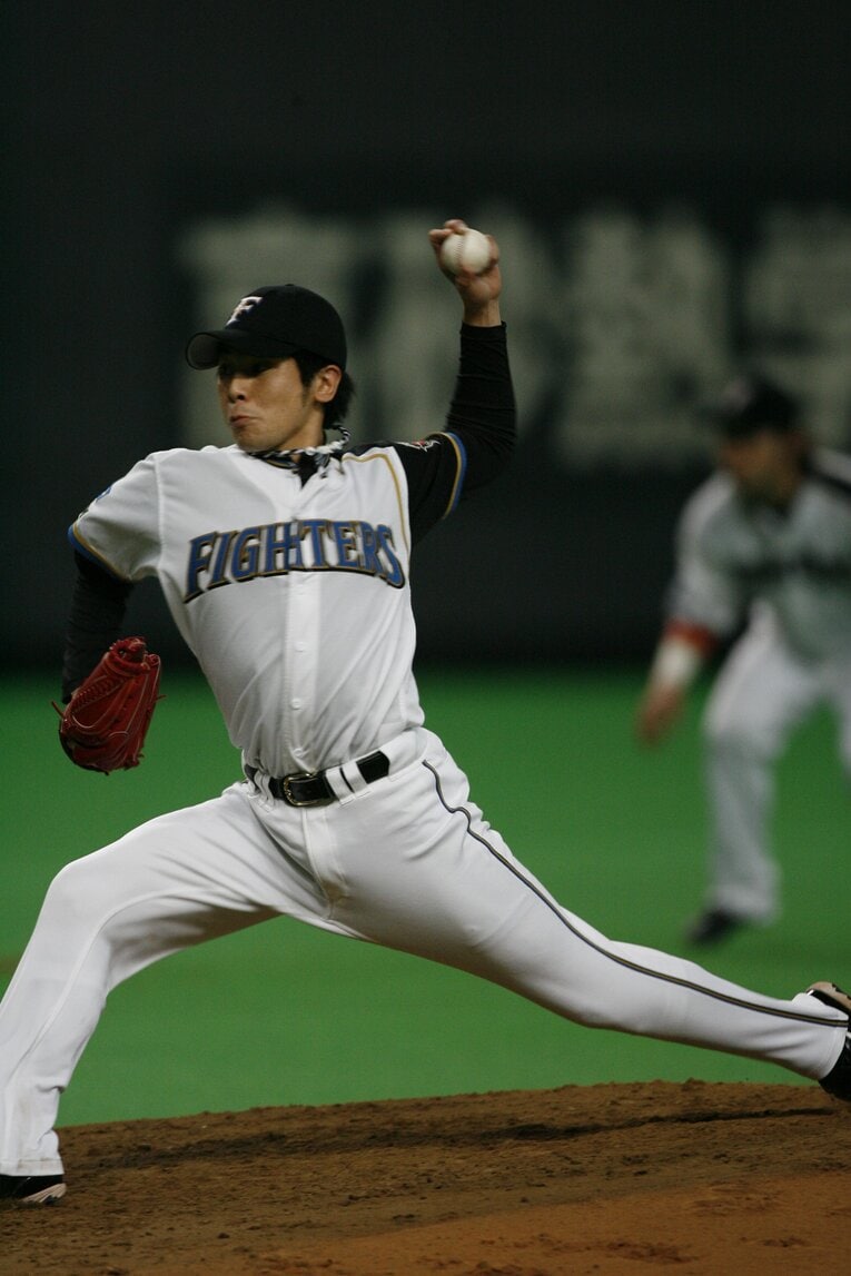 野間口から1年遅れのドラフトで日ハムに入団した武田。左のエースとして活躍した　©BUNGEISHUNJU