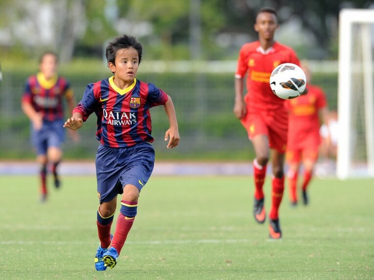 【日本サッカー名選手レア写真集】2013年の久保建英（12歳）。画像は右に続きます　©Getty Images