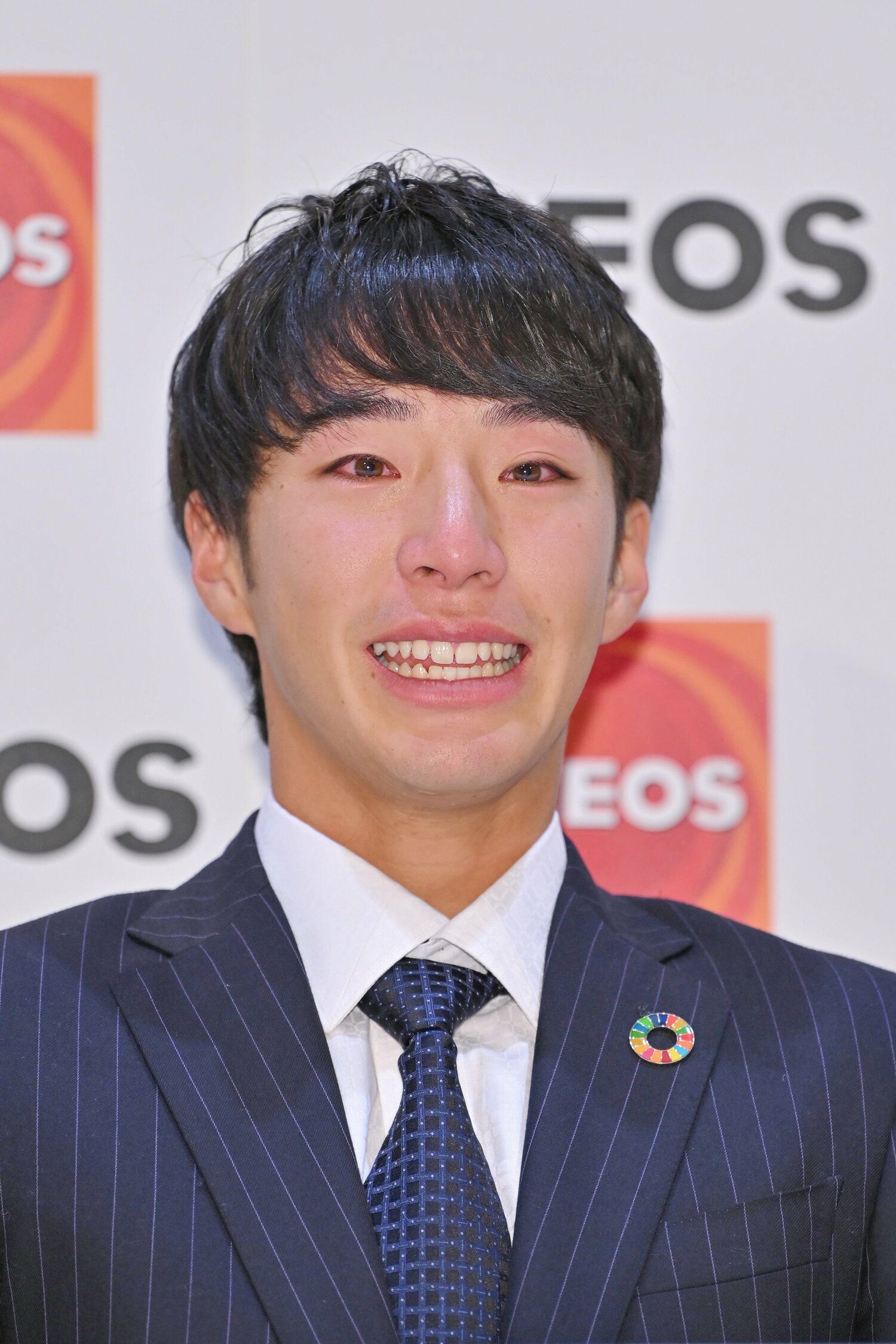 2020年ドラフトでの指名漏れからドラフト1位指名を受け、喜びの涙を浮かべる度会　©JIJI PRESS