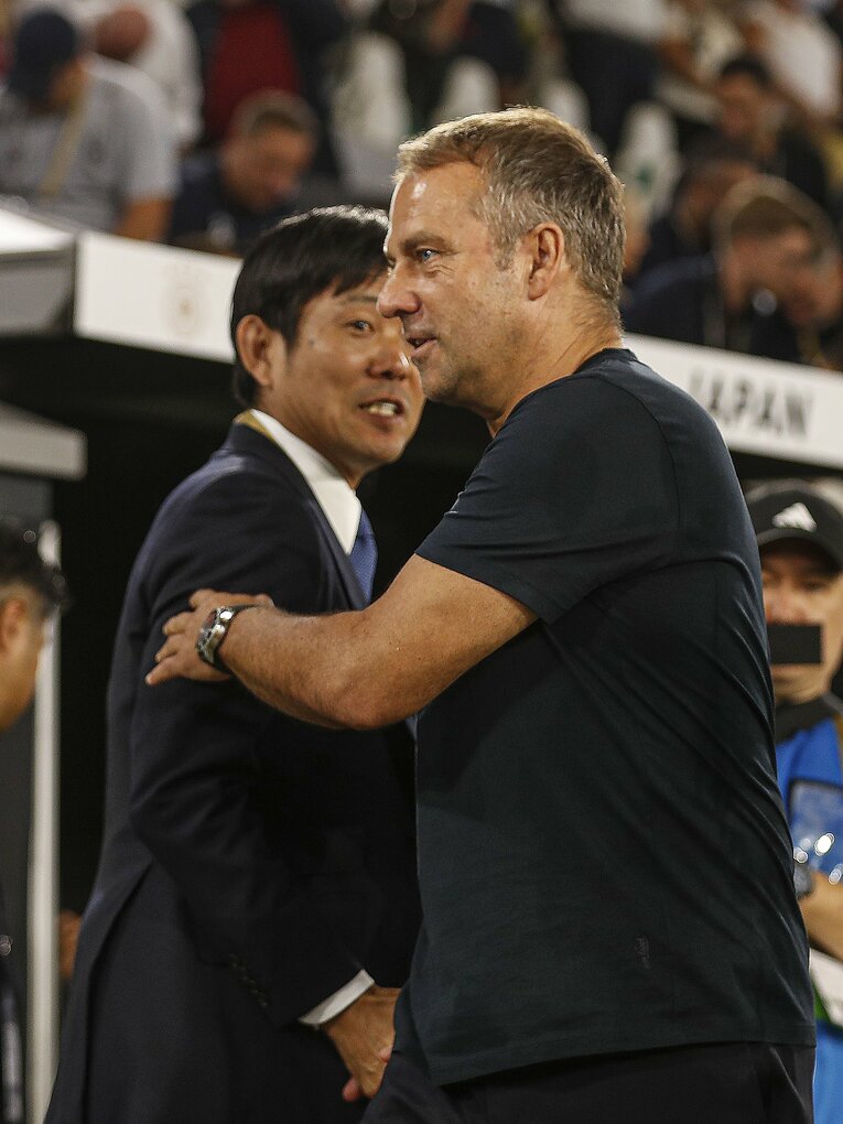 この1年で明暗が分かれた森保監督とフリック監督　©Sipa USA/JIJI PRESS