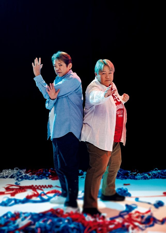 （右）長与千種（ながよ・ちぐさ）／1964年12月8日生、長崎県出身。'80年全日本女子プロレスでデビュー。'89年に引退後、'93年に復帰。'94年自身の団体GAEA JAPANを設立する。里村芽衣子、加藤園子らを育て、2005年に2度目の引退。'14年、新団体マーベラスを設立。現在は同団体で後進を指導
（左）ライオネス飛鳥（らいおねす・あすか）／1963年7月28日生、埼玉県出身。'80年全女でデビュー。'89年に引退し、長与復帰の翌年の'94年に自身も復帰。途中からヒール転向し旋風を巻き起こす。'98年からGAEA JAPANで長与と抗争を繰り広げたのち、'00年「クラッシュ2000」を結成した。'05年に2度目の引退　©︎Takuya Sugiyama