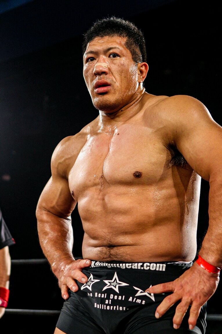 分厚い筋肉に覆われた30代の関根の肉体　©Susumu Nagao