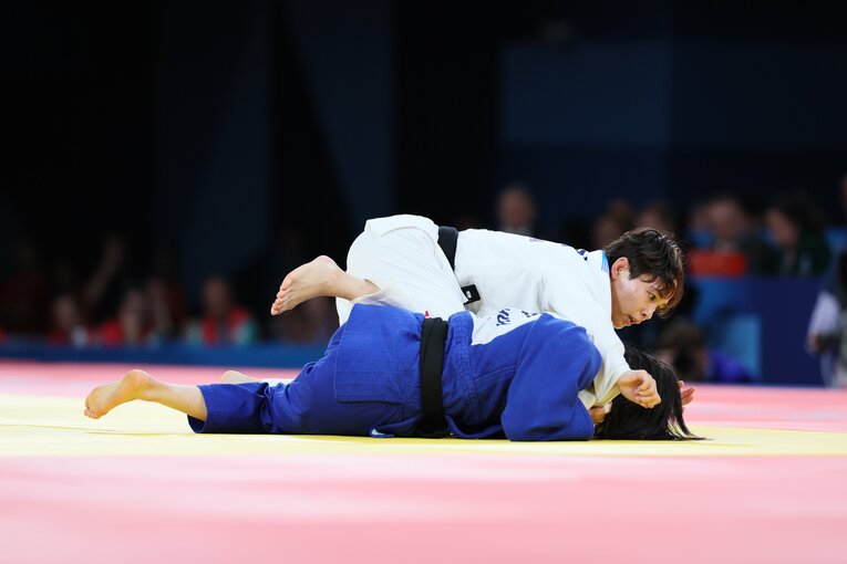 出口とホ・ミミの激闘　©Kaoru Watanabe/JMPA