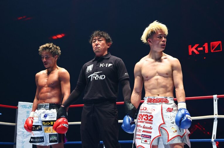 3月20日に行われたK-1対RISEの対抗戦。判定が読み上げられた瞬間、戸惑いの表情を浮かべるRISEの門口佳佑 ／ photograph by RISE/Chiyo Yamamoto