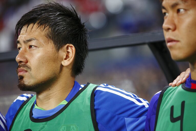 日本代表として戦う松井大輔 　©松園多聞