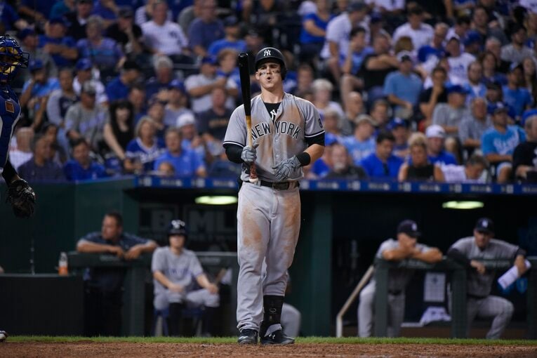 伝統のユニフォームを泥だらけにしてプレー　©Getty Images