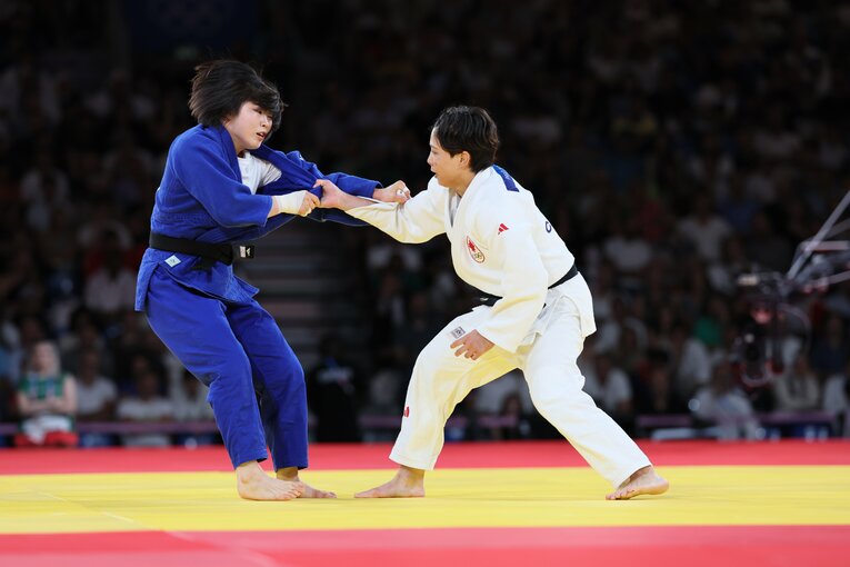 出口とホ・ミミの激闘　©Kaoru Watanabe/JMPA