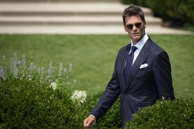 ホワイトハウスでバイデン大統領と会うためにスーツで正装するブレイディ（2021年撮影）　©Getty Images