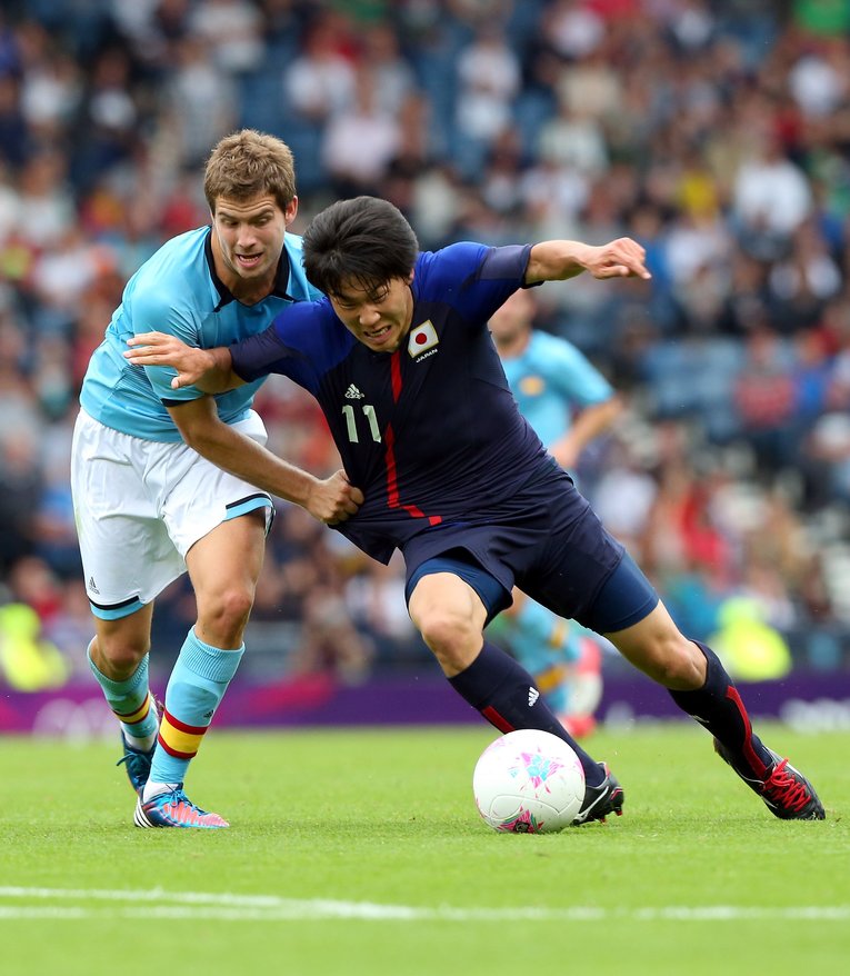 永井の執拗な高速プレスは明らかにスペインを苦しめていた　©︎Getty Images