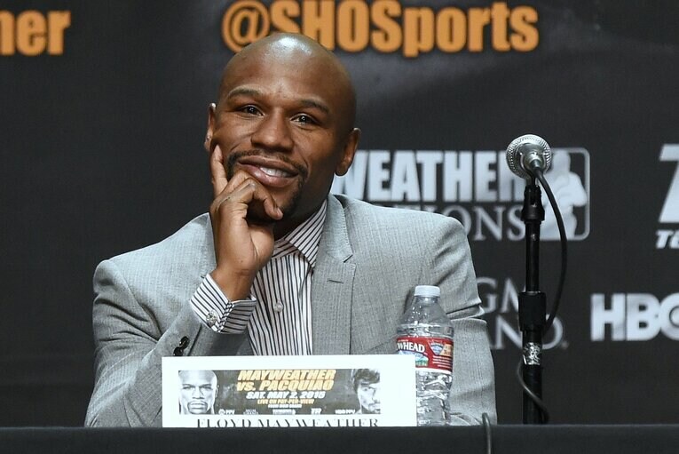 パッキャオ戦前の会見で余裕の笑顔　©Naoki Fukuda