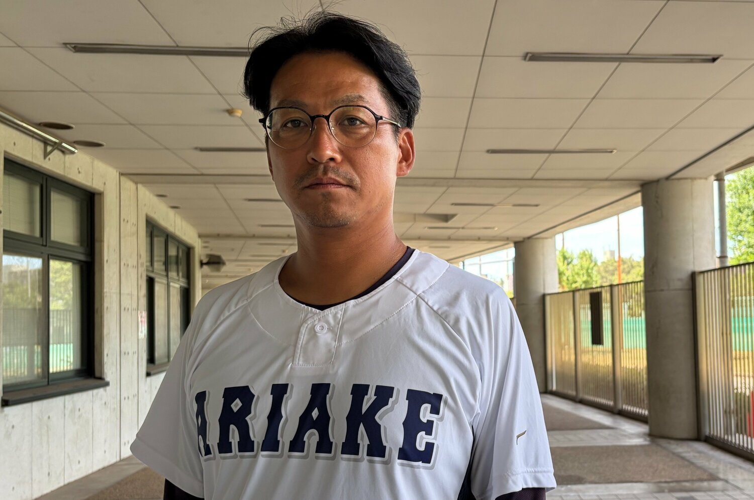 有明高校を率いる高見監督 ©Genki Taguchi