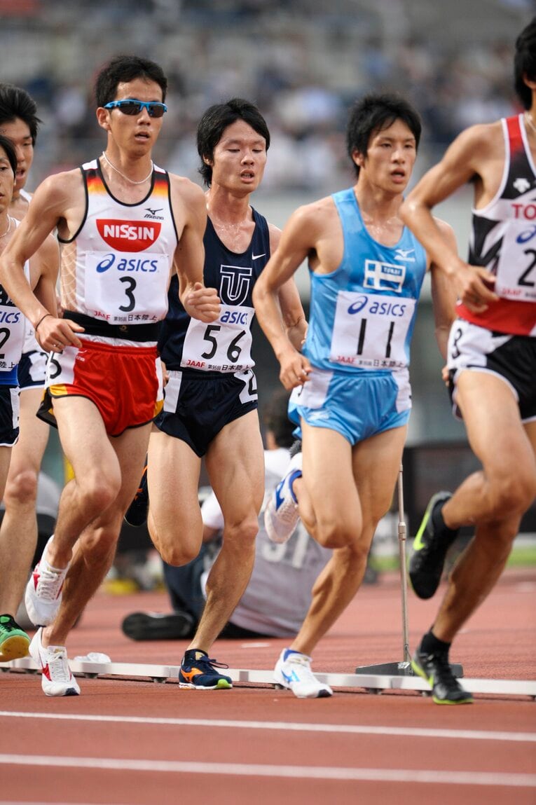 2011年日本選手権での佐藤（左）。柏原竜二（中央）村澤明伸と箱根駅伝のスターと競った　©Asami Enomoto