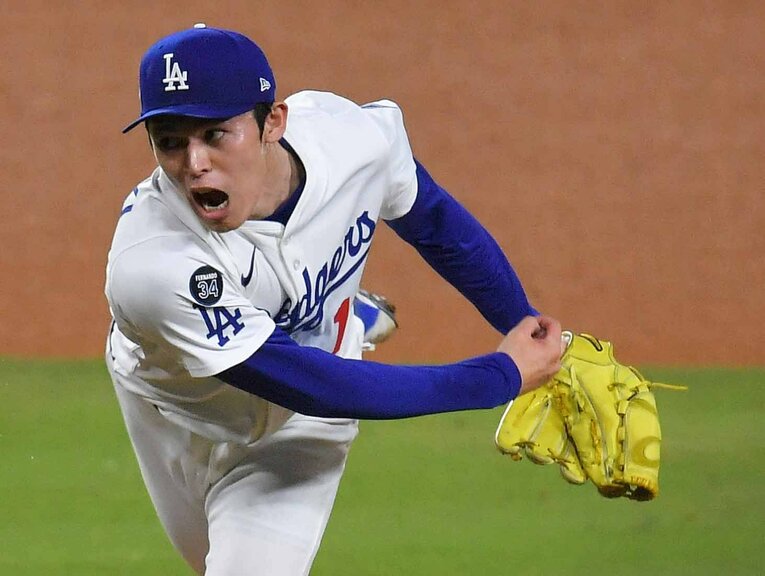 ポストシーズンではリリーフとして大きな存在感を放った佐々木　©JIJI PRESS