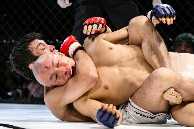 大石真丈vs.徹肌ィ郎　©Susumu Nagao