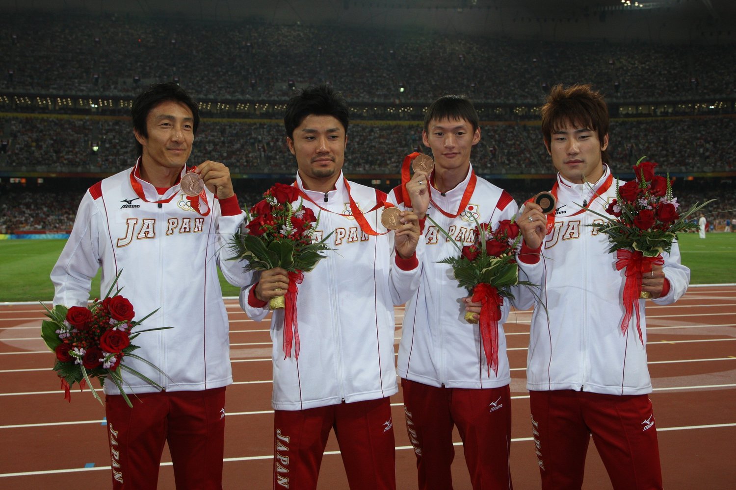 2008年の北京五輪で銅メダルを獲得した4×100ｍ日本代表チーム（この後、繰り上がりで銀メダルに）。左から朝原宣治、末続慎吾、高平慎士、塚原直貴　©JMPA