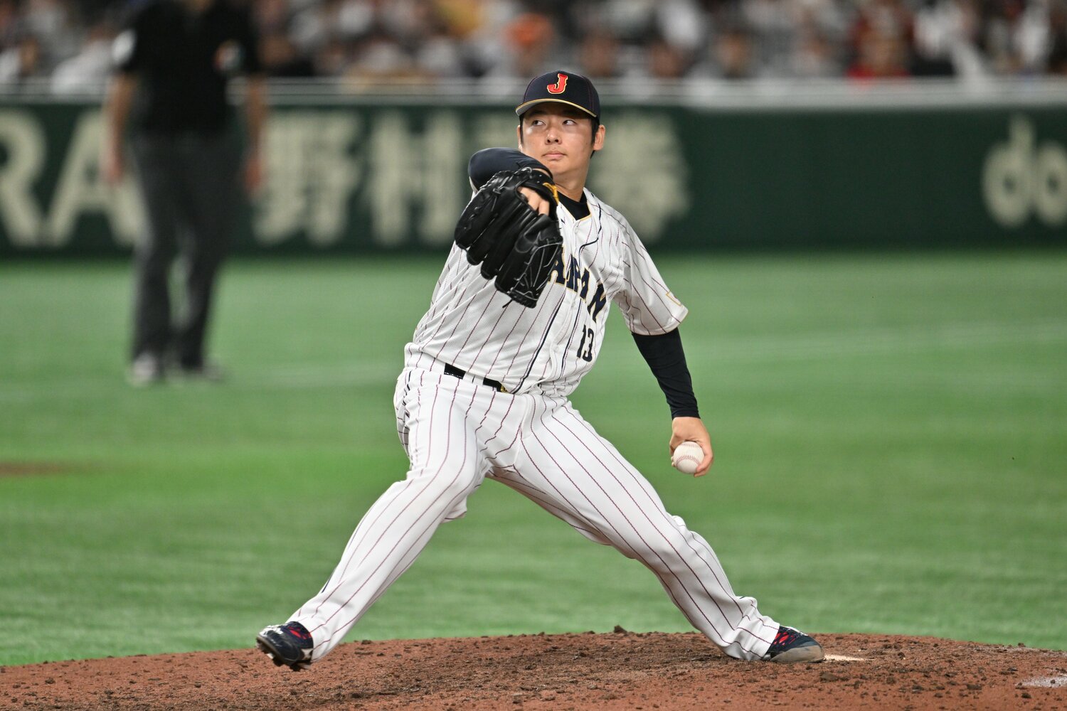 韓国戦で登板、3者凡退に抑えた　©Naoya Sanuki