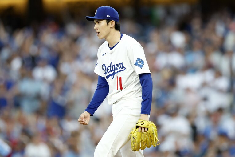 10月10日のフィリーズとの第4戦では、3イニングを完璧に抑えた佐々木　©JIJI PRESS