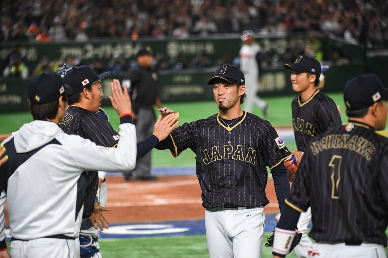 前回WBCで好リリーフを連発した秋吉　©BUNGEISHUNJU