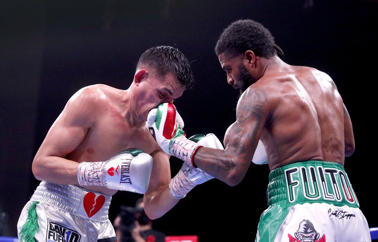 今も背中に残る傷、今では隠さずに堂々とリングに上がっている　©Getty Images