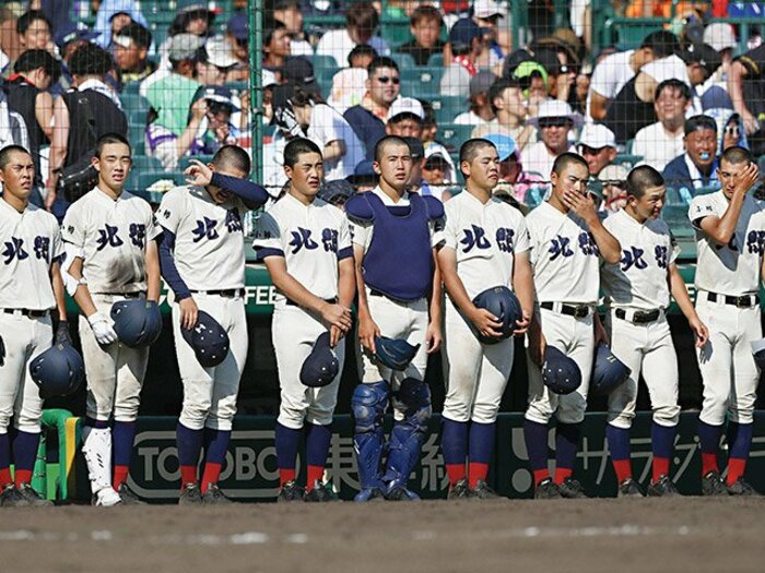 北照高・上林弘樹監督の甲子園。2カ月前の春の大会では塁審姿。＜Number Web＞ photograph by Kyodo News