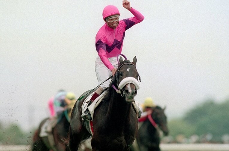 日本ダービーを制した際のナリタブライアンと南井克己騎手 ／ photograph by JIJI PRESS