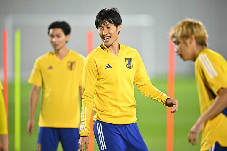 W杯時、練習で笑顔の鎌田　©Koki Nagahama/JMPA