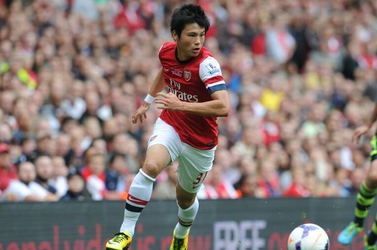 2013年9月のストーク戦でプレーするアーセナルの宮市亮。体調不良者が出たため当日急遽メンバー入りを知らされ、走ってスタジアムに向かった ／ photograph by Getty Images