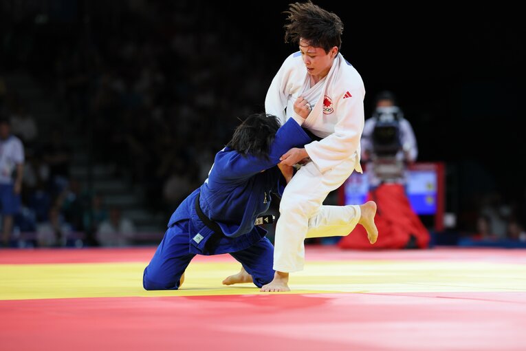 出口とホ・ミミの激闘　©Kaoru Watanabe/JMPA