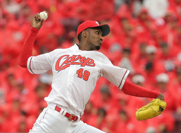 リーグ3連覇の最後の年となった2018年、2年目のアドゥワは中継ぎとして53試合に登板しカープのブルペンを支えた　©JIJI PRESS