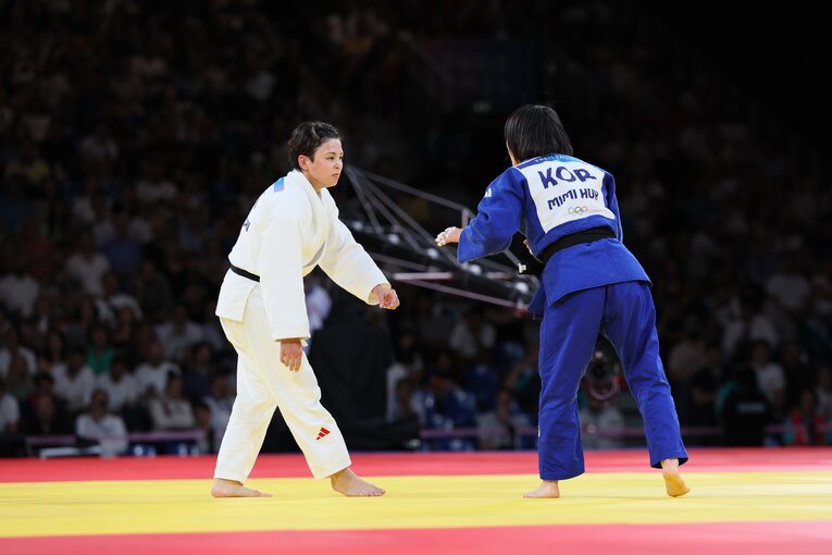 出口とホ・ミミの激闘　©Kaoru Watanabe/JMPA